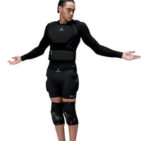 Person wearing a black body armor suit on a white background