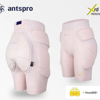Antspro 9mm XRD protective shin and thigh guards shown from both front and back views on a light gray background, featuring a white and pale pink color scheme with technical specifications and brand logos.