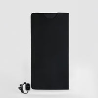 A black PU leather folding massage blanket with a controller, designed for far-infrared heating, lightweight, foldable, waterproof, and easy to store.