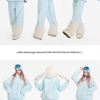 Light blue winter outfit with beige boots and accessories on a white background