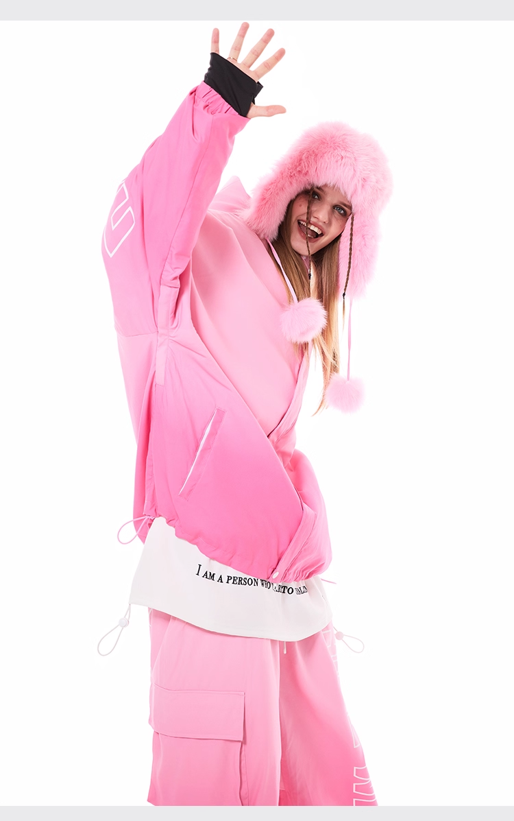 Person wearing a pink outfit with a hood on a white background