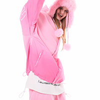 Person wearing a pink outfit with a hood on a white background