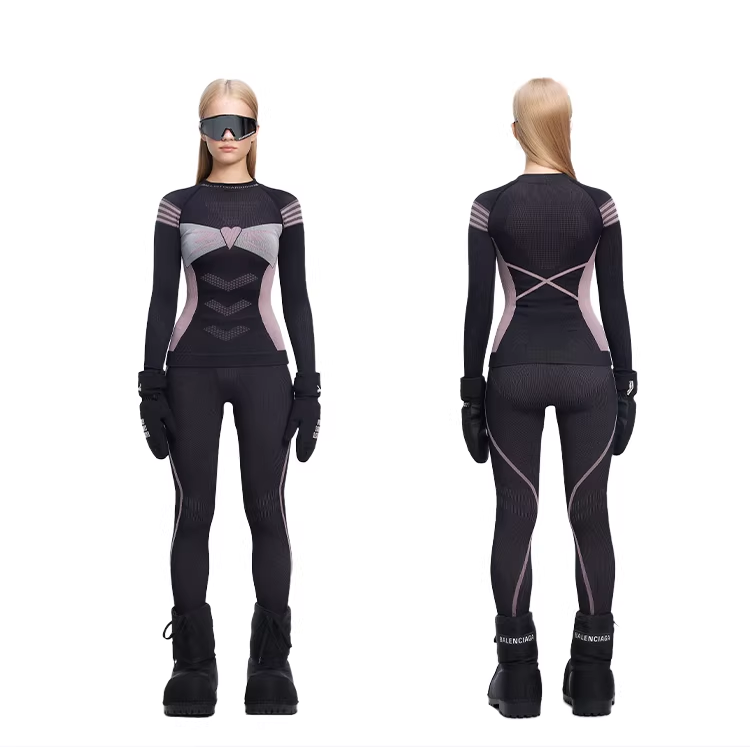 Black and gray outfit with gloves and boots on a white background