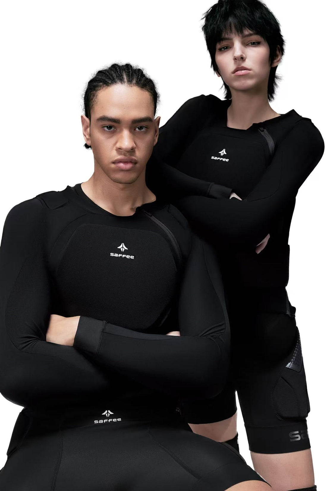 Two people wearing protective gear with a brand logo on a white background