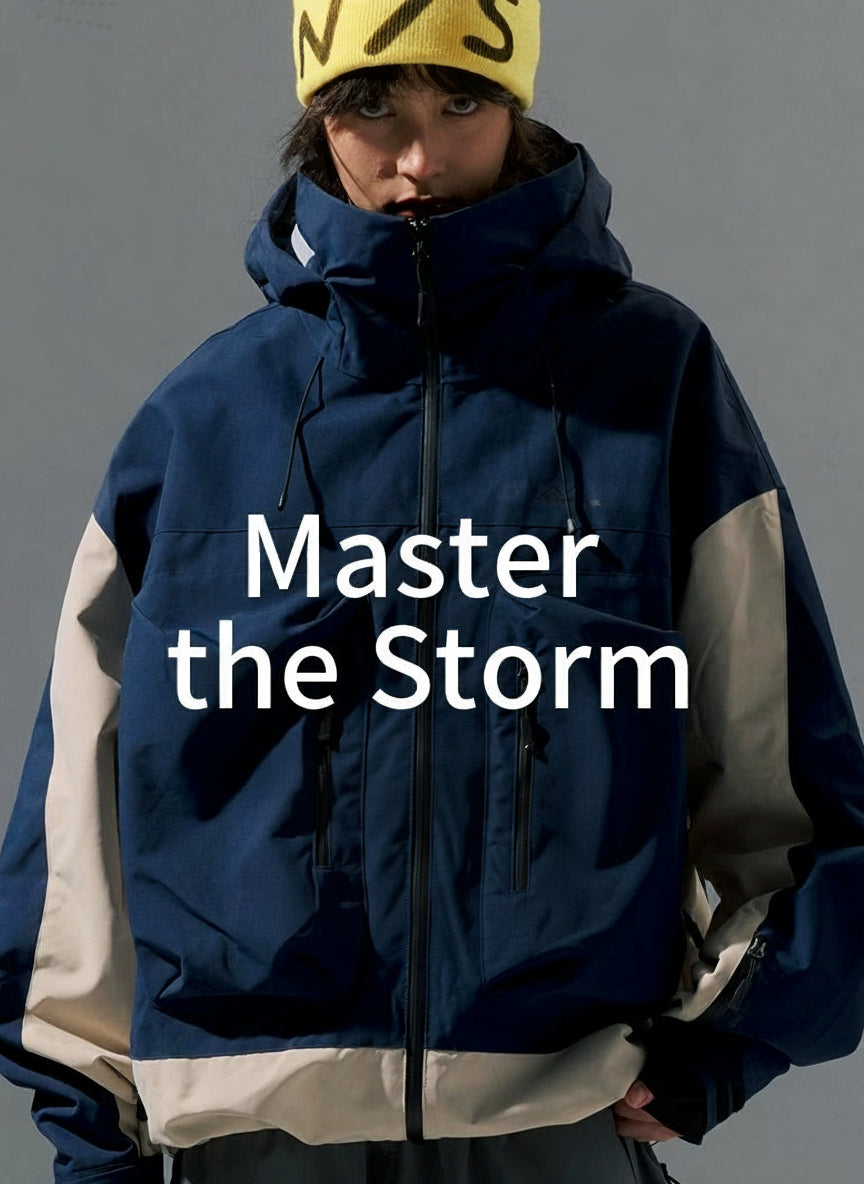 Person wearing a blue and beige jacket with text 'Master the Storm' on a gray background