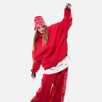 Person wearing a red outfit with white text on a plain background
