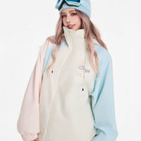 Person wearing a light-colored jacket with 'Swagli' branding, standing against a white background.