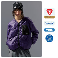 Person wearing a purple jacket with brand logos on a gray background