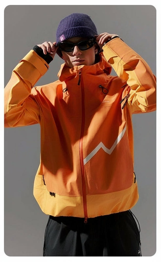 Person wearing an orange waterproof snowboarding jacket