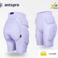 Light purple protective pad shorts shown from the back and side, featuring padded hip, buttock, and knee areas. The image includes the Antspro brand logo, an Xrd Protection badge, and a 9mmXRD feature callout on a clean light gray background.