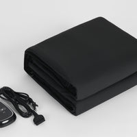 A lightweight, foldable, waterproof PU leather infrared therapy sauna blanket with a controller, designed for easy storage and use.