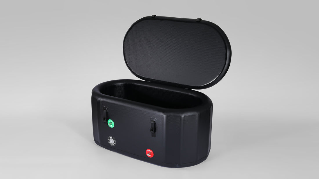 A compact, black inflatable ice bath tub with opening lid